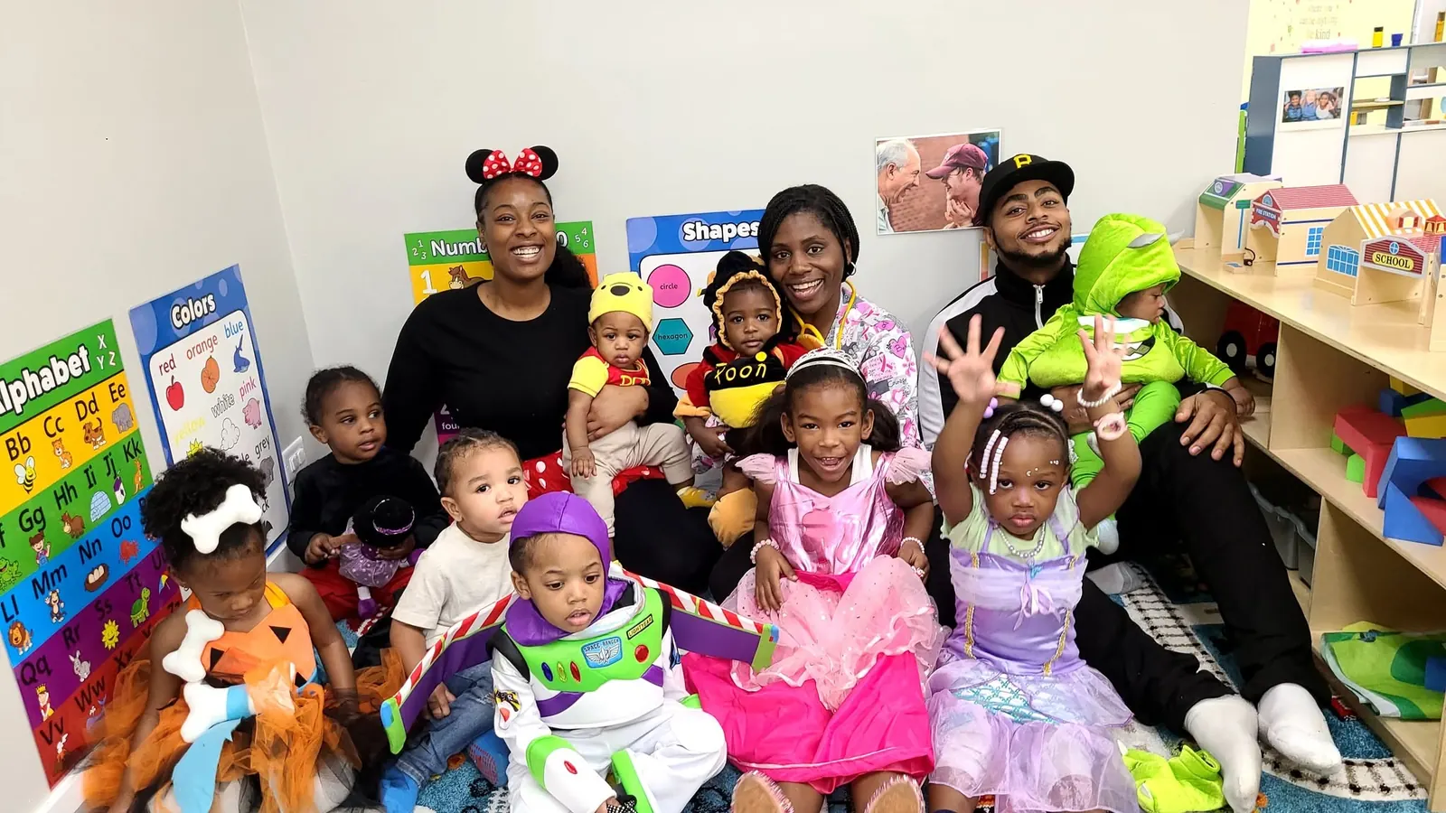 Children and staff celebrating costume day together