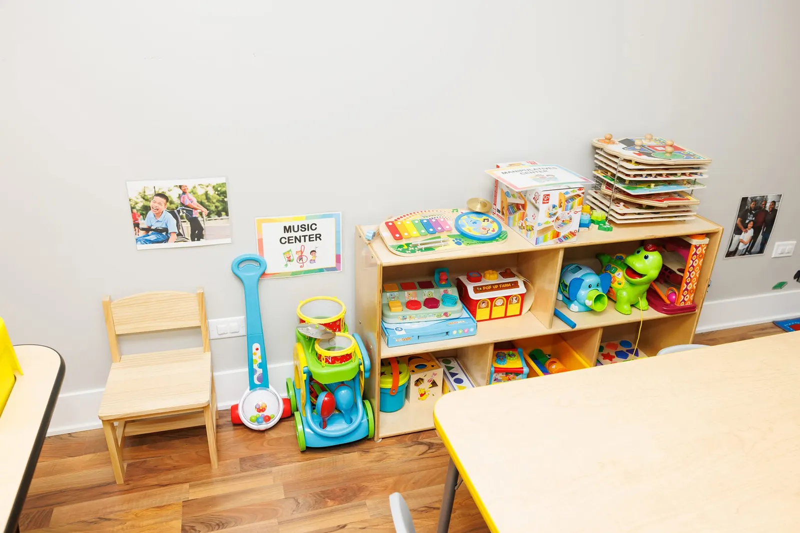 Music center shelves stocked with instruments and puzzles